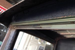 3a-The-original-color-behind-the-windshield-frame-hinge-web-size